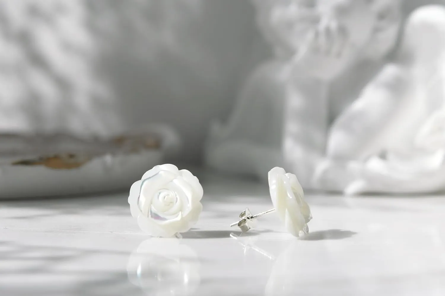 AeraVida White Mother of Pearl Stud Earrings | 925 Sterling Silver | Elegant Carved Floral Earrings | Classic Pearl Jewelry for Women | Lightweight & Timeless
